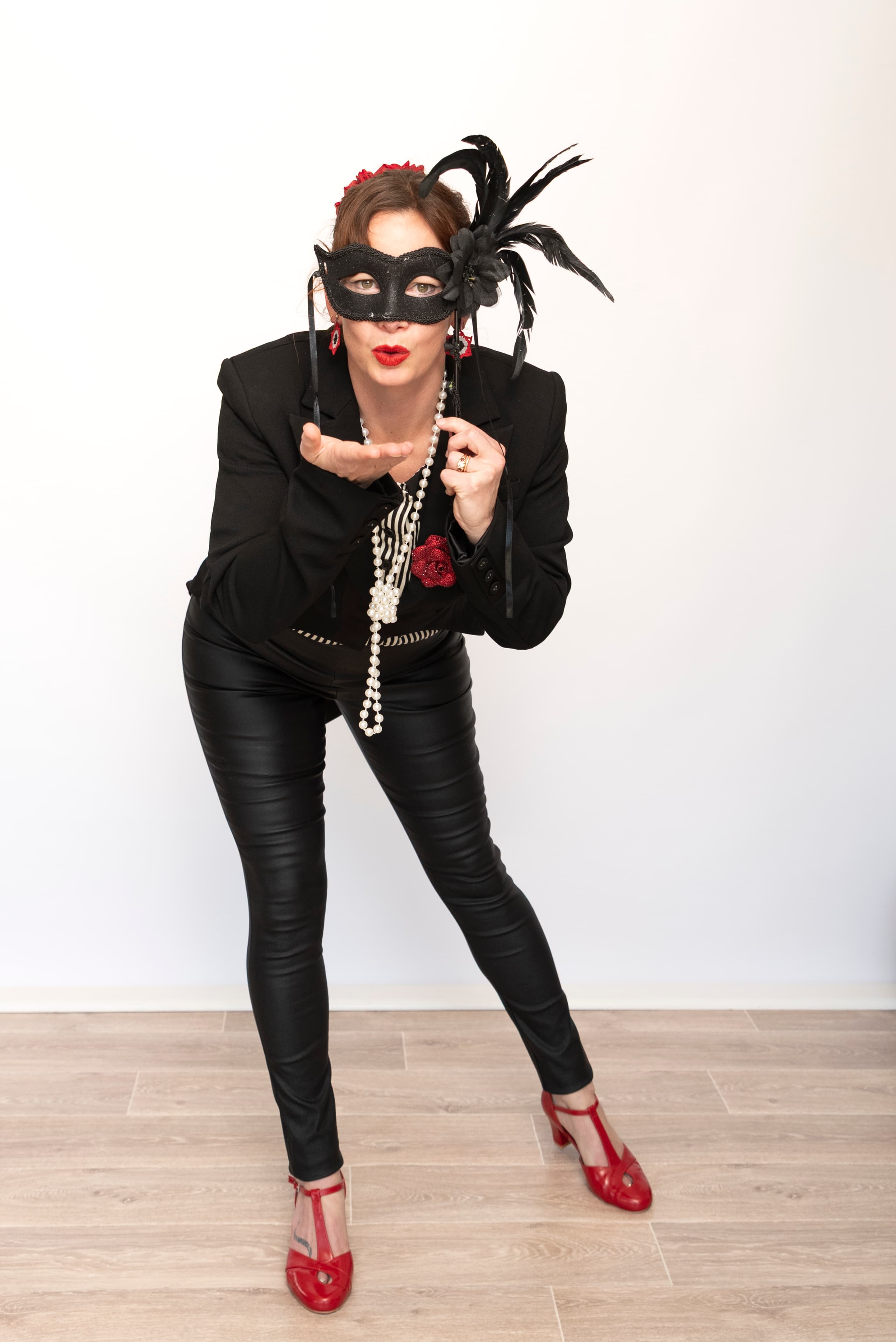 Steffanie in a masquerade mask