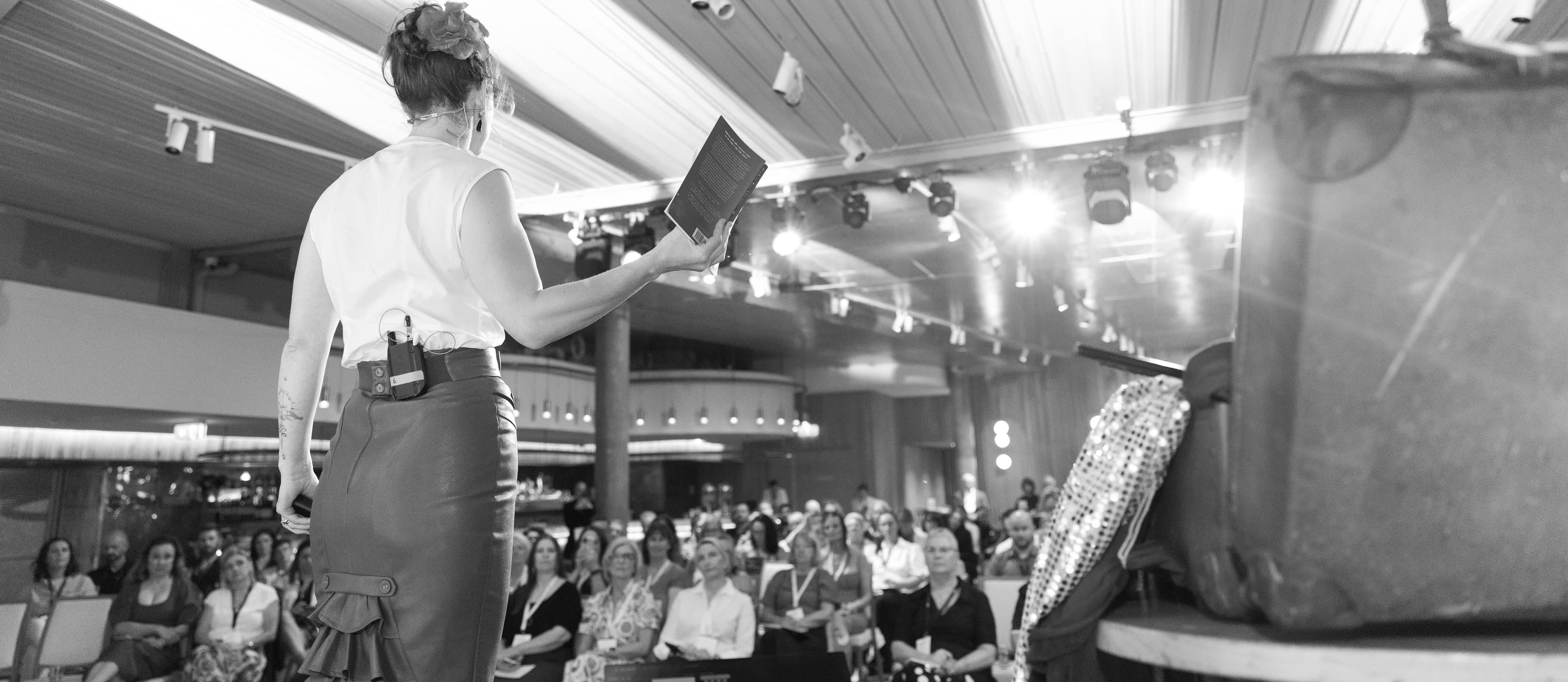Steffanie Smith speaking to a conference audience